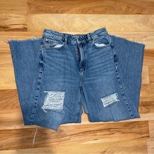 Garage Dark blue wash, rip skater wide leg jeans.